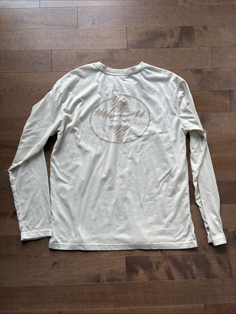 Women's Long-Sleeve Crew Tee in Light Cream with Subtle Back Graphic